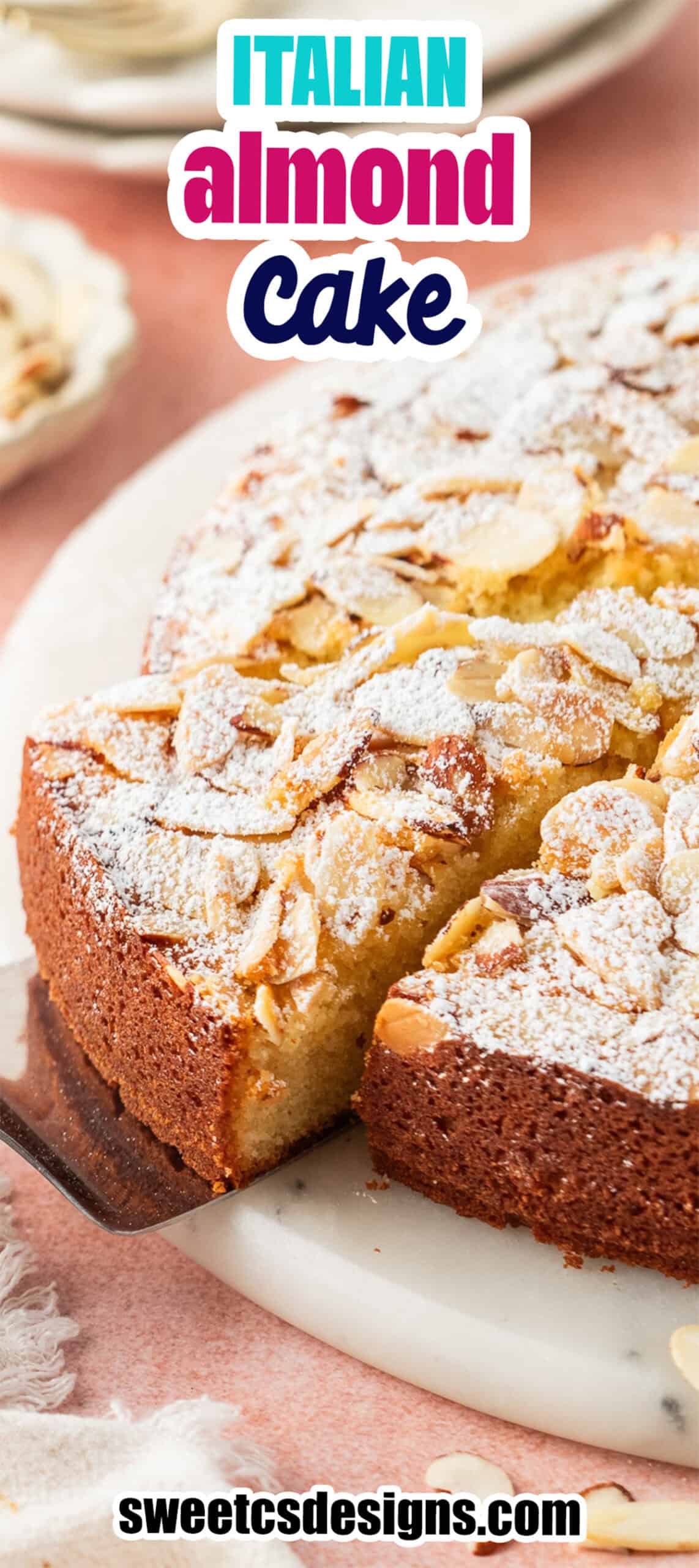 Italian almond cake topped with sliced almonds and powdered sugar, with an easy almond cake slice being lifted by a cake server.