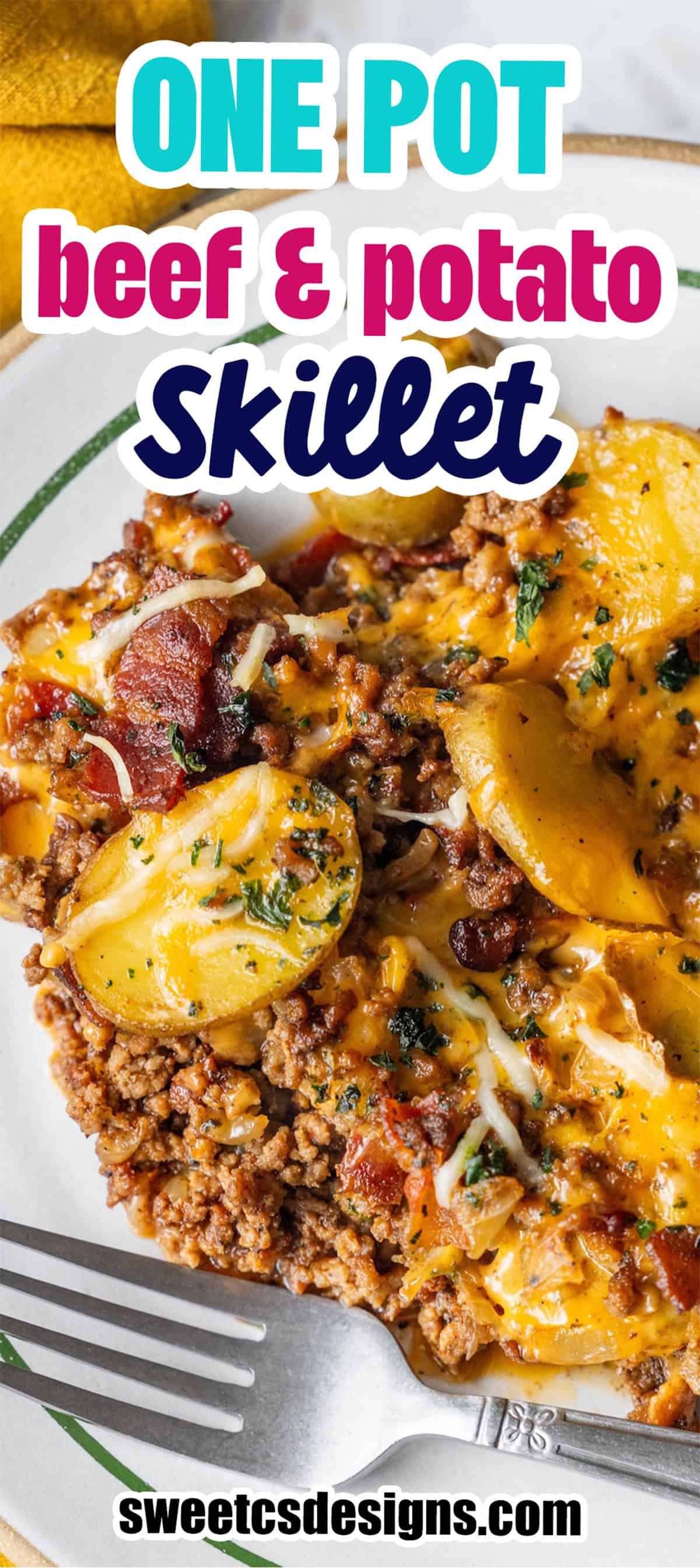A plate of cheesy potato bake with beef, topped with melted cheese, bacon, and herbs, with a fork in the foreground and text overlay reading “ONE POT beef & potato Skillet”.